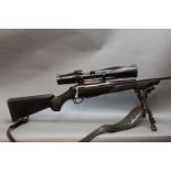 A Tikka T3 Cal 222 bolt action rifle, with a black synthetic stock, detachable magazine,