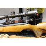 A Logun Axsor Cal 22 PCP pre charged pneumatic air rifle, fitted with a silencer,