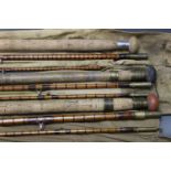 Three split cane rods, one in 3 sections, 10' 6", and two 3 section.