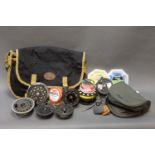 A Shakespeare tackle bag containing a selection of fly tying equipment, lines, leaders,