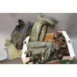 A box containing a pair of Barbour wellingtons size 7, another pair of wellingtons,