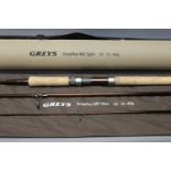 A Greys Greyflex M2 spinning rod, 3 sections, with hard rod tube.