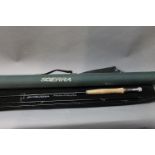 A Sierra Avalanche trout fly rod in three sections, 9' line 6-7 with hard rod tube.