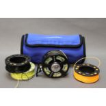 An Airflo CST69 trout fly reel, with three spare spools and a still water Neoprene reel case.