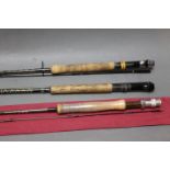 Three trout fly rods, an Abu Garcia custom graphite in two sections, 9',