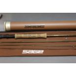 A Sage SLT 7100-4 graphite 3E trout fly rod, in four sections, 10', line 7, with hard rod tube.