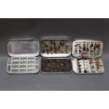 Three alloy fly boxes including a dry fly box, containing trout flies.