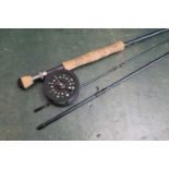 A Greys GRX trout fly rod, 3 sections, 9' 6", fitted with a Shakespeare trout fly reel.