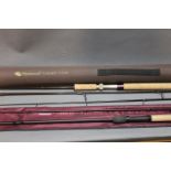 A Wychwood True Spin rod in three sections, 10', with hard rod tube,