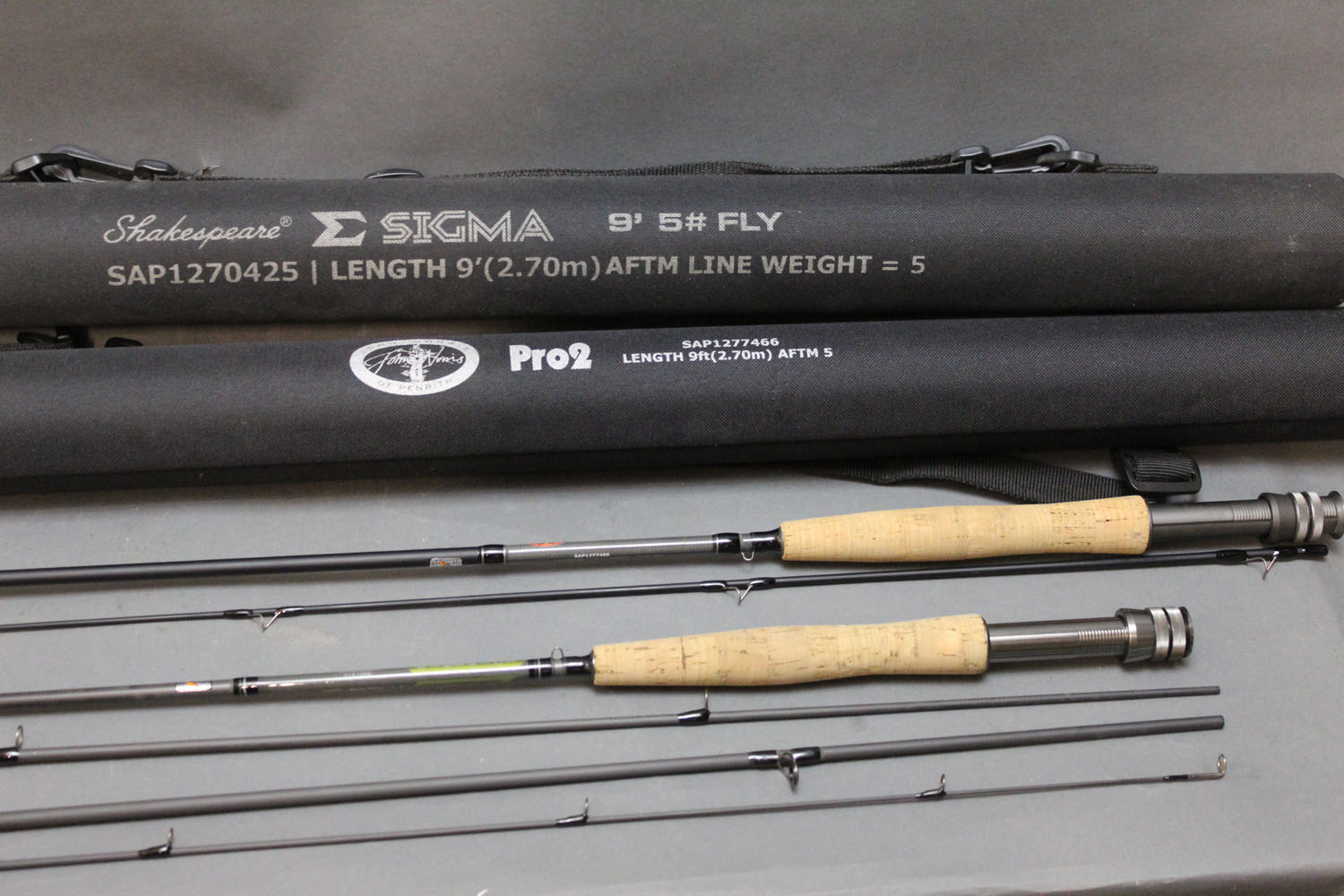 A Shakespeare Sigma trout fly rod in four sections, 9', line 5,