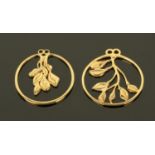 Two 9 ct gold pendants, modelled as leaves and branches in a circular mount. Diameter 3.