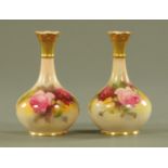 A pair of Royal Worcester club shaped vases, decorated with roses, one signed "Blake",