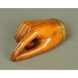A good 19th century snuffbox, in the form of a hand taking a pinch of snuff (see illustration).