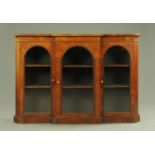A Victorian rosewood breakfront bookcase,
