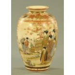 A Japanese Satsuma vase, decorated with figures and with red seal mark to base. Height 25 cm.