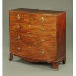 An early 19th century mahogany bow front chest of drawers,