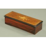 A 19th century Swiss musical box, with 13" comb, playing eight airs and with inlaid mahogany case.