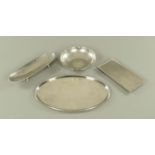 Keswick School of Industrial Art, four pieces of Firth Staybrite hand beaten stainless steel,