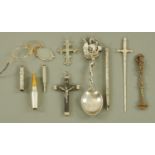 A Continental spoon, a sword letter opener, crucifix, cigar cutter, etc.