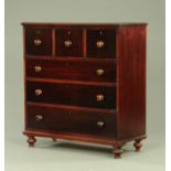 A Victorian dark stained pine chest of drawers,