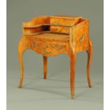 A Louis XV style parquetry ladies desk, fitted with a series of drawers and pullout writing surface,