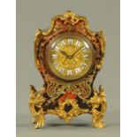 A French boulle style mantle clock, late 19th century, with rococo style gilt metal mounts,