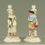 A pair of Continental porcelain figural candlesticks, late 19th century,