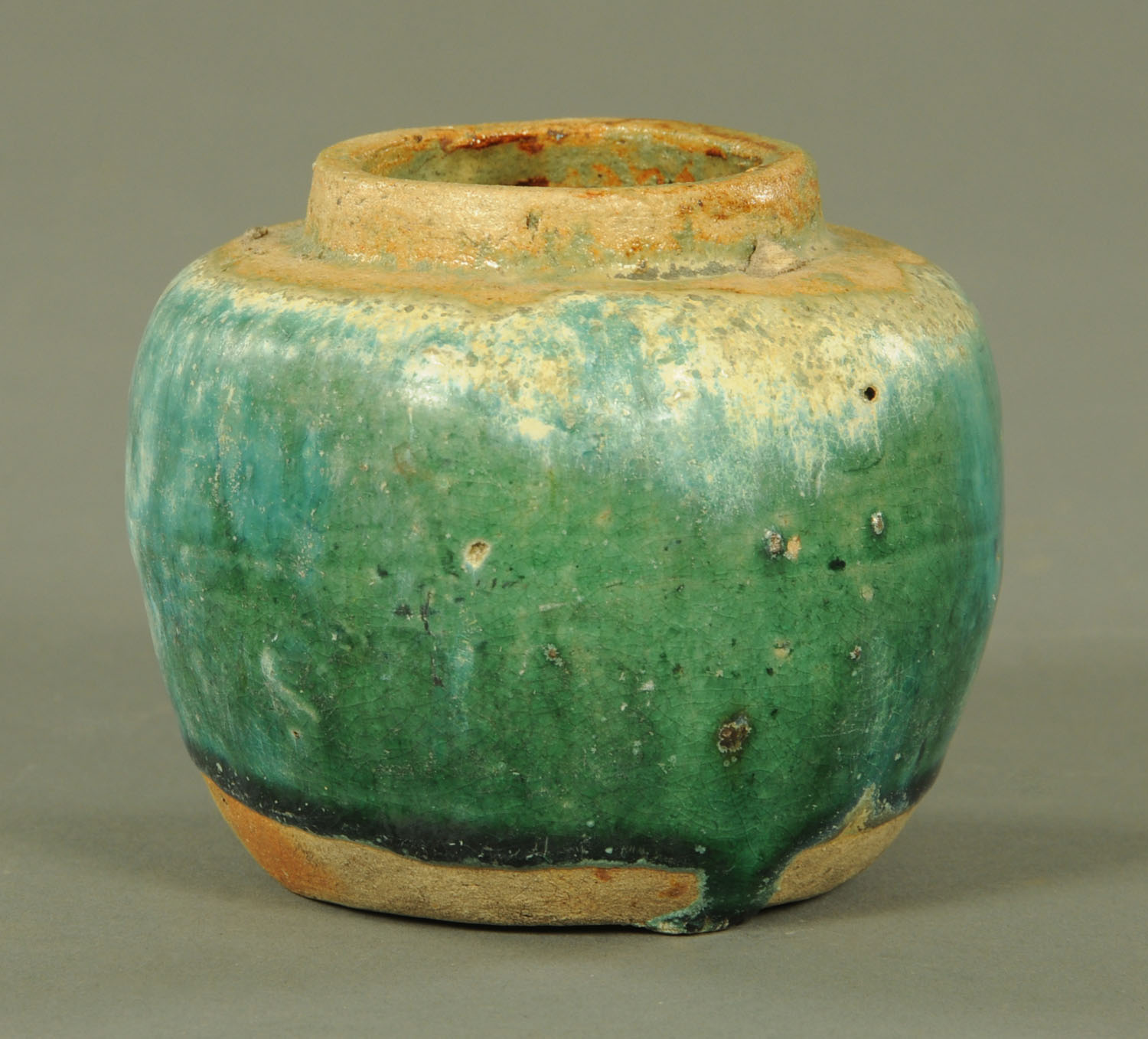 A Chinese Shiwan pottery vase, 19th century, with turquoise/green glaze,