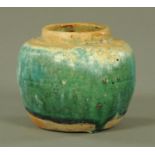 A Chinese Shiwan pottery vase, 19th century, with turquoise/green glaze,