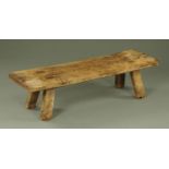 A 19th century oak pig bench,