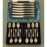 A case of 12 silver coffee spoons and tongs, maker Joseph Rodgers & Son,