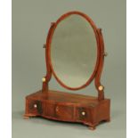 A Georgian mahogany serpentine fronted toilet mirror,