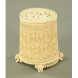 An early 20th century Indian carved ivory cylindrical pot,