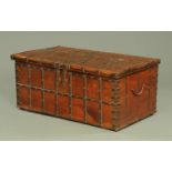 A large hardwood trunk, with iron strap bindings and double lock plates,