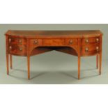 A large George III mahogany sideboard,