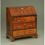 An early 18th century walnut bureau,