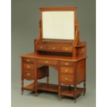 A late Victorian walnut dressing table,