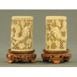 A pair of Chinese ivory carved and pierced vases, 19th century Qing,