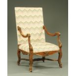 A Louis XIV style armchair, with upholstered back and seat,