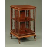A late Victorian mahogany revolving bookcase,