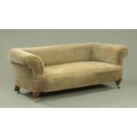 A Victorian upholstered Chesterfield settee with sprung horsehair filling,