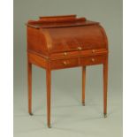 An Edwardian mahogany cylinder bureau, with ebony strung decoration,