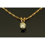An 18 ct two tone gold diamond set pendant on yellow gold chain, diamond weight +/-.30 carats.