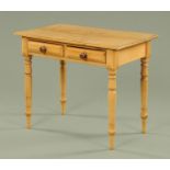 A Victorian pine two drawer side table,