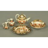 A 19th century Crown Derby Imari pattern trio,