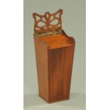A George III inlaid mahogany candle box, with fretwork hanger. Height 44.5 cm.