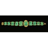 A Victorian malachite bracelet, graduated links and set in gold coloured metal mounts, length 16.
