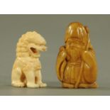 A 19th century carved ivory miniature dog of Fo, seated on its haunches, 4 cm high,