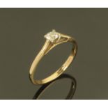 A solitaire diamond ring in 9 ct gold mount, ring size N, 1.4 grams gross weight.