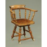 A 19th century smokers bow style swivel office chair,
